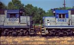 CSX 6590 & 6682 exhibit differences in similar paint scheme